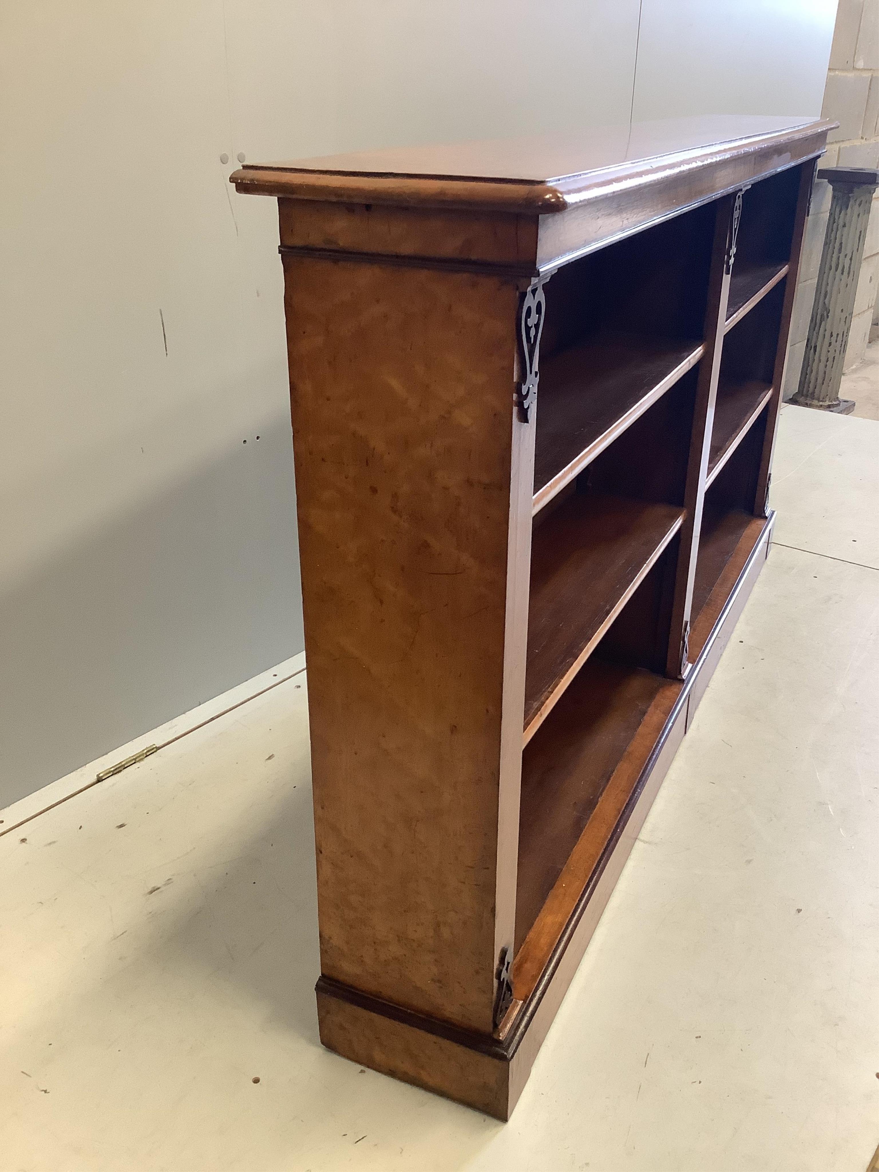 A Victorian bird's eye maple dwarf open bookcase, width 172cm, depth 27cm, height 95cm. Condition - good